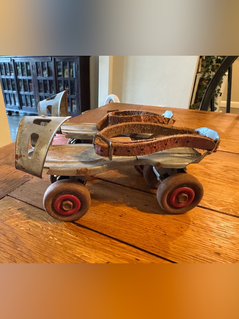 Vintage Metal Roller Skates with Leather Straps